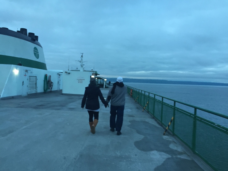 couple walking on edmonds-kingston ferry